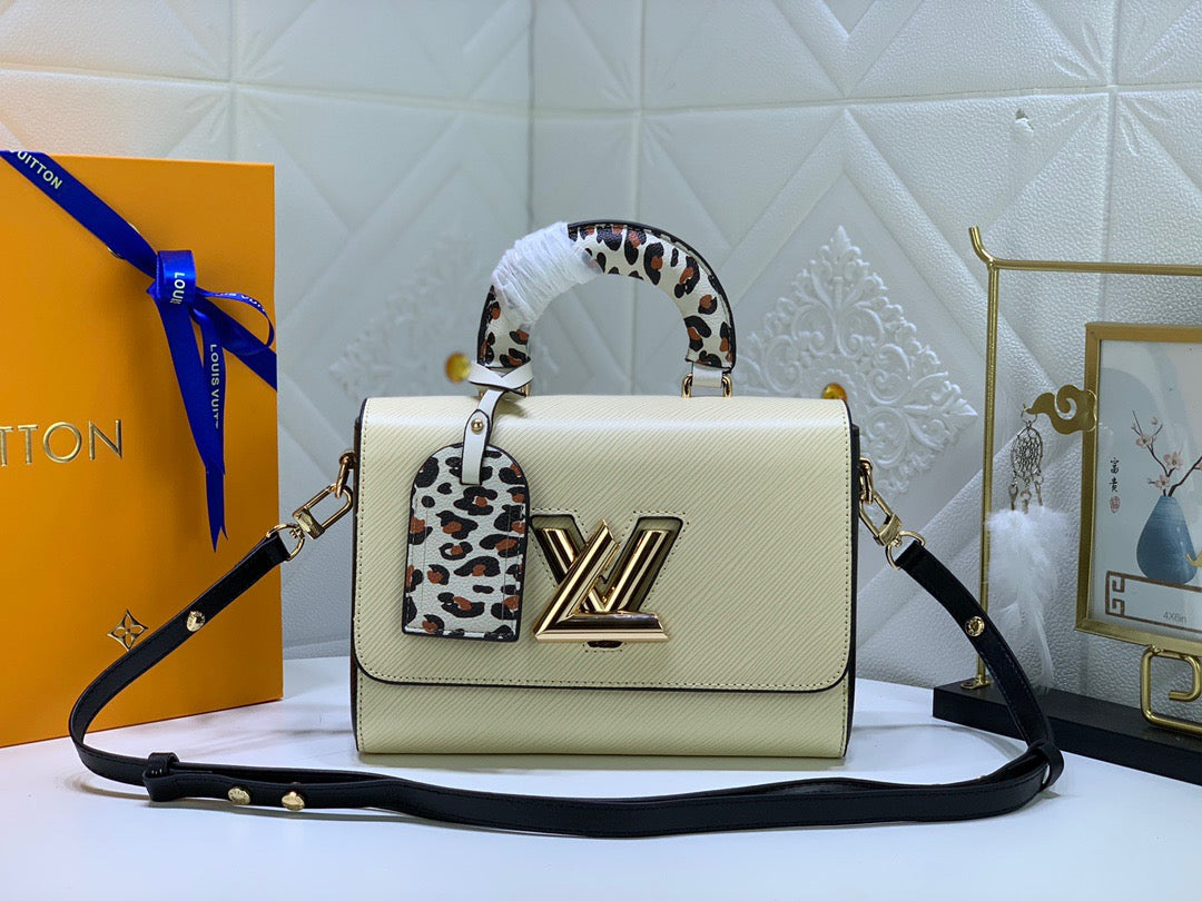 Louis Vuitton Twist Pouch In Beige Epi Leather With Leopard Print Handle