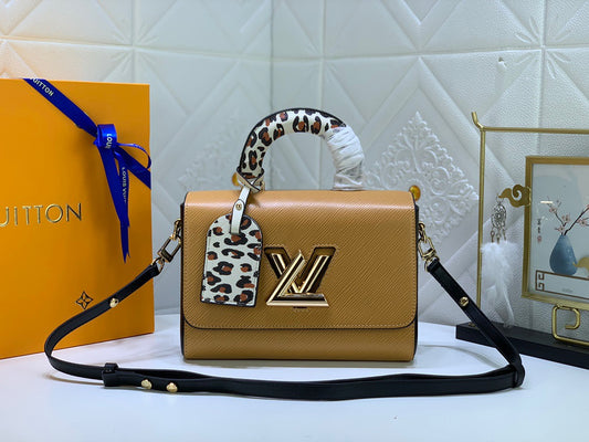 Louis Vuitton Twist Pouch In Brown Epi Leather With Leopard Print Handle