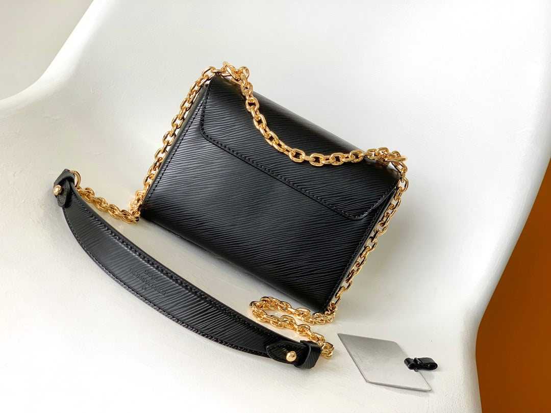 Louis Vuitton Twist Pouch In Black Epi Leather With Gold Chain