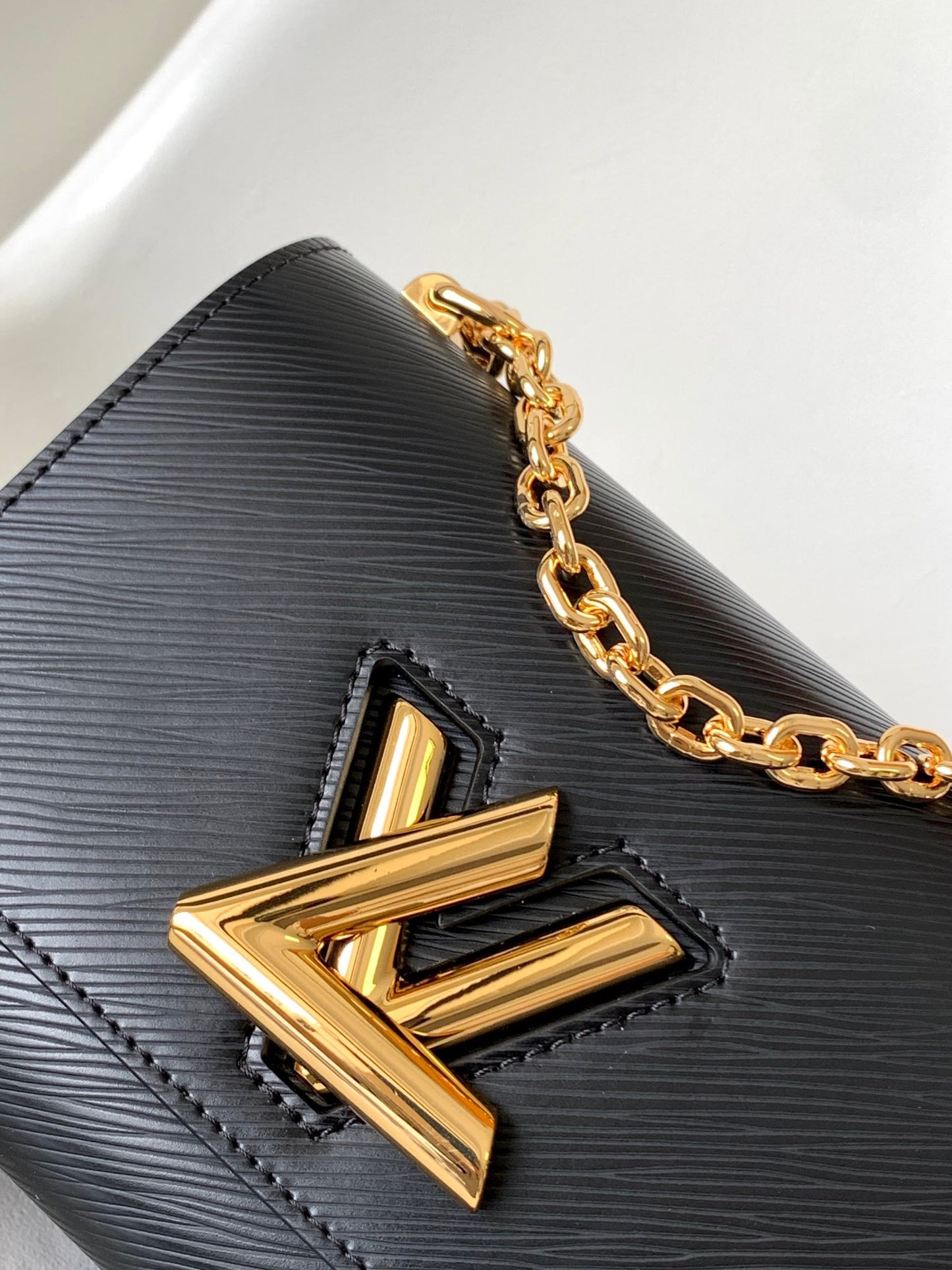 Louis Vuitton Twist Pouch In Black Epi Leather With Gold Chain