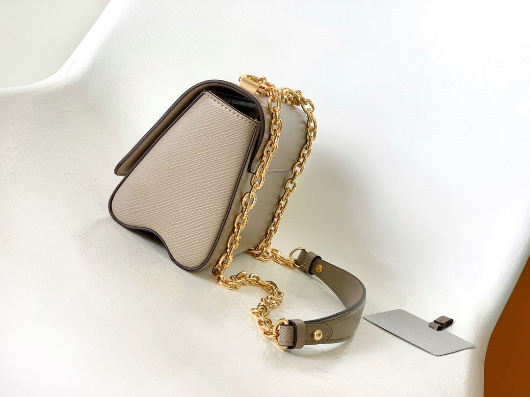 Louis Vuitton Twist Pouch In Brown Epi Leather With Gold Chain