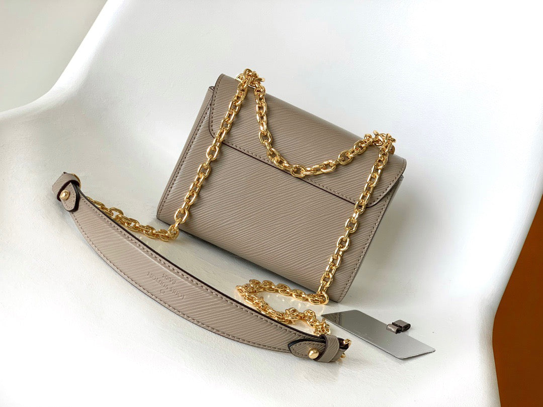 Louis Vuitton Twist Pouch In Brown Epi Leather With Gold Chain