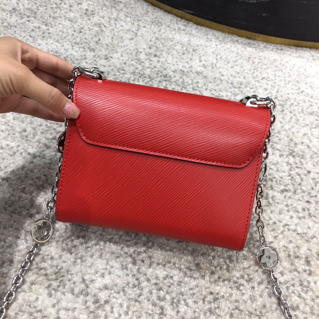 Louis Vuitton Twist Pouch In Red Epi Leather With Silver Chain