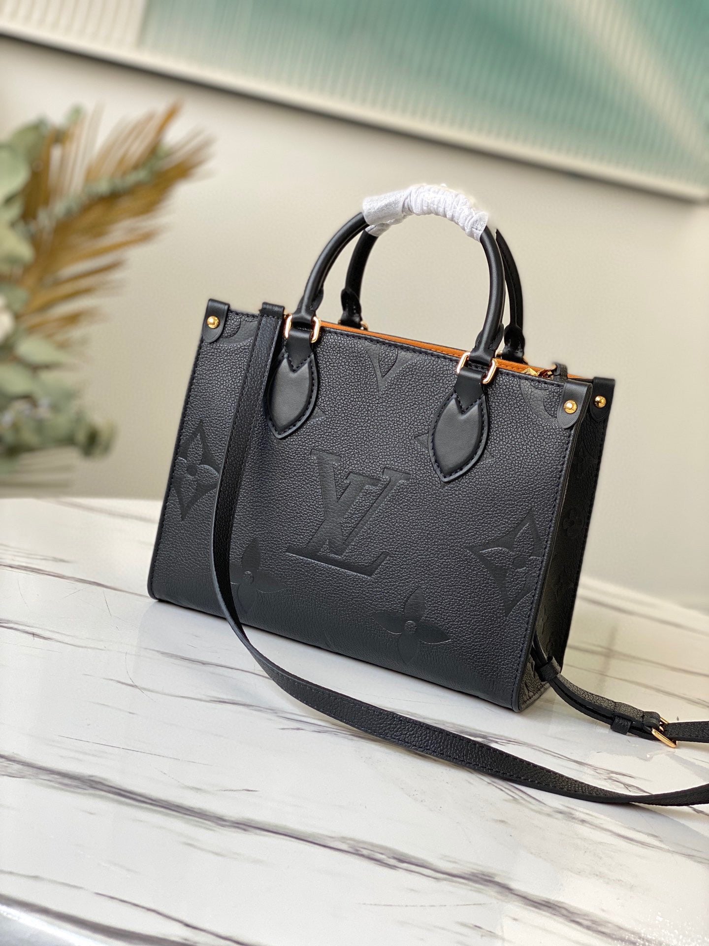 Louis Vuitton Onthego In Black Embossed