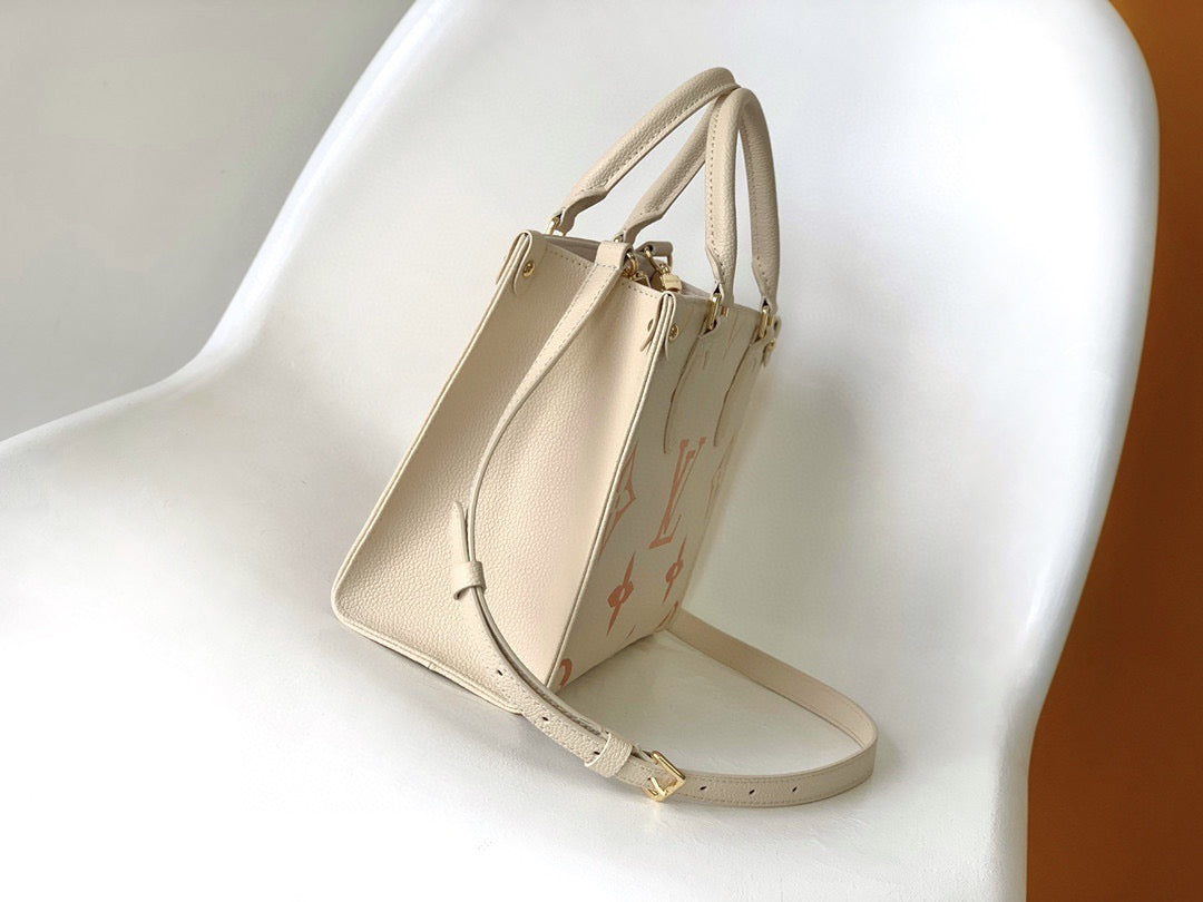 Louis Vuitton Onthego In Beige With Embossed Canvas Bag