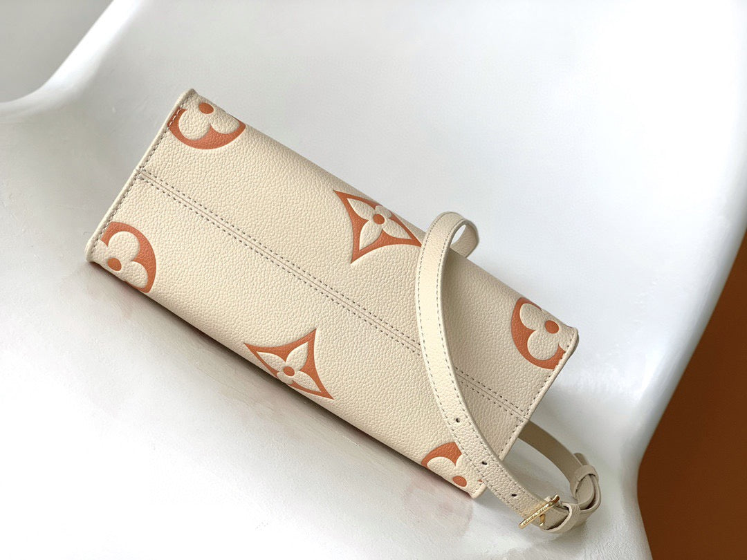 Louis Vuitton Onthego In Beige With Embossed Canvas Bag