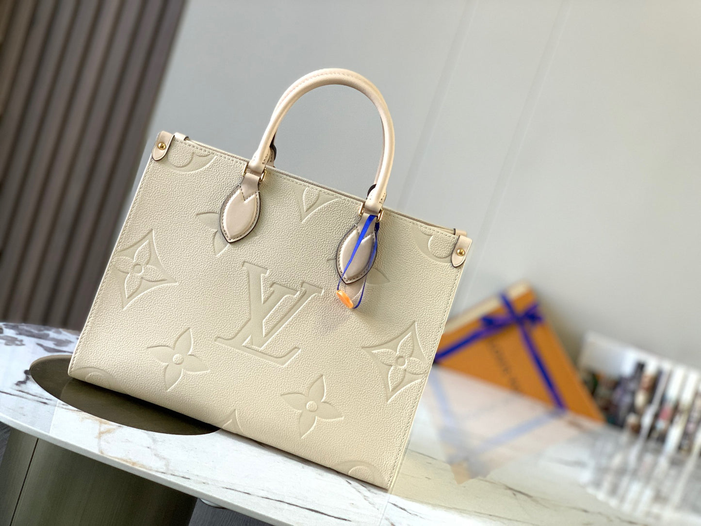 Louis Vuitton Onthego Handbags With Beige Embossed