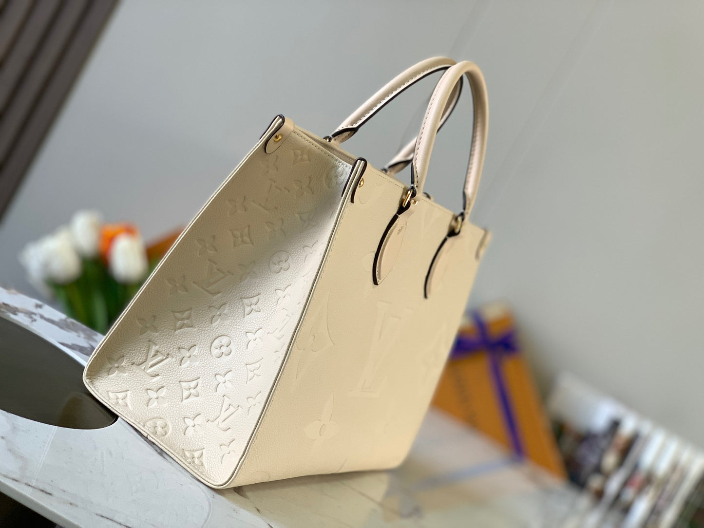 Louis Vuitton Onthego Handbags With Beige Embossed