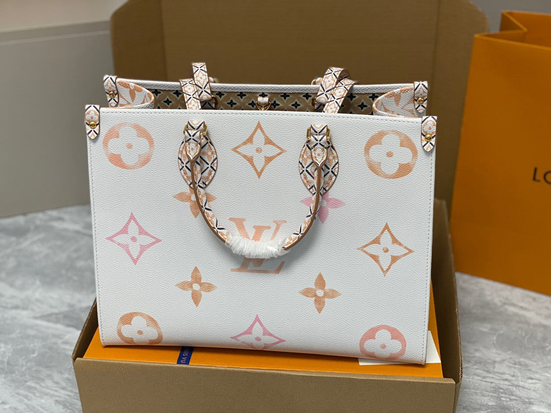 Louis Vuitton Onthego Handbags In White With Orange Embossed