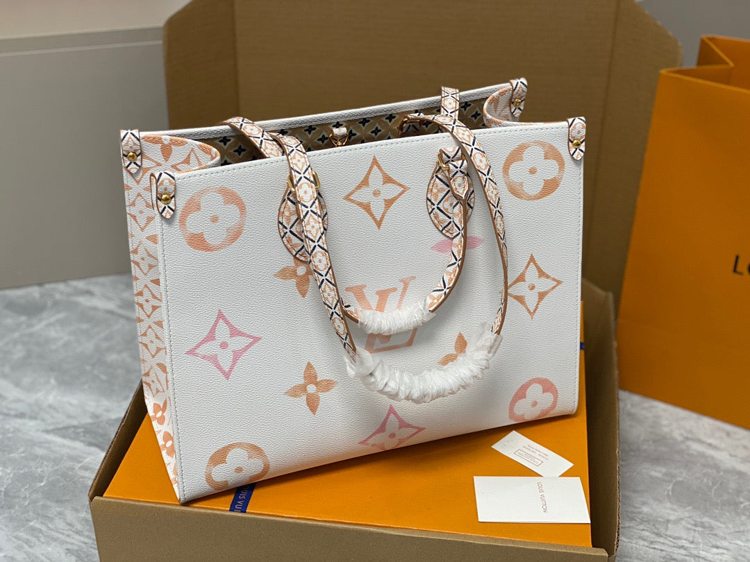 Louis Vuitton Onthego Handbags In White With Orange Embossed