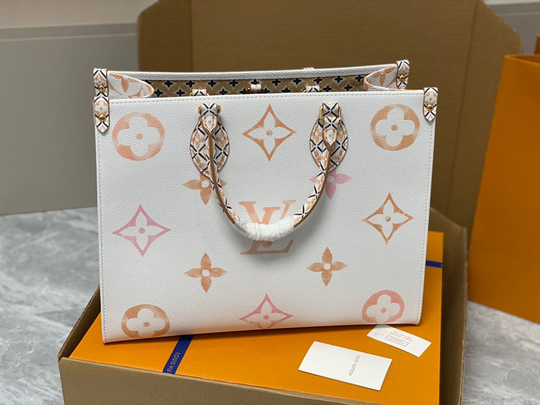 Louis Vuitton Onthego Handbags In White With Orange Embossed