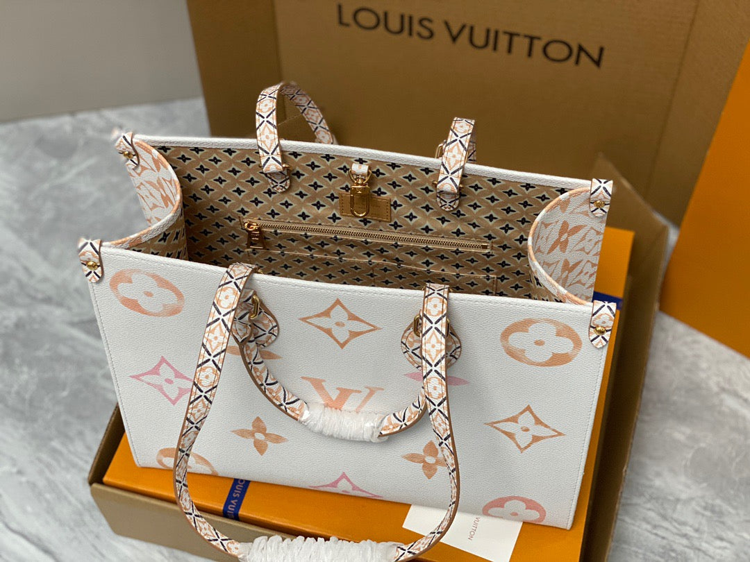 Louis Vuitton Onthego Handbags In White With Orange Embossed