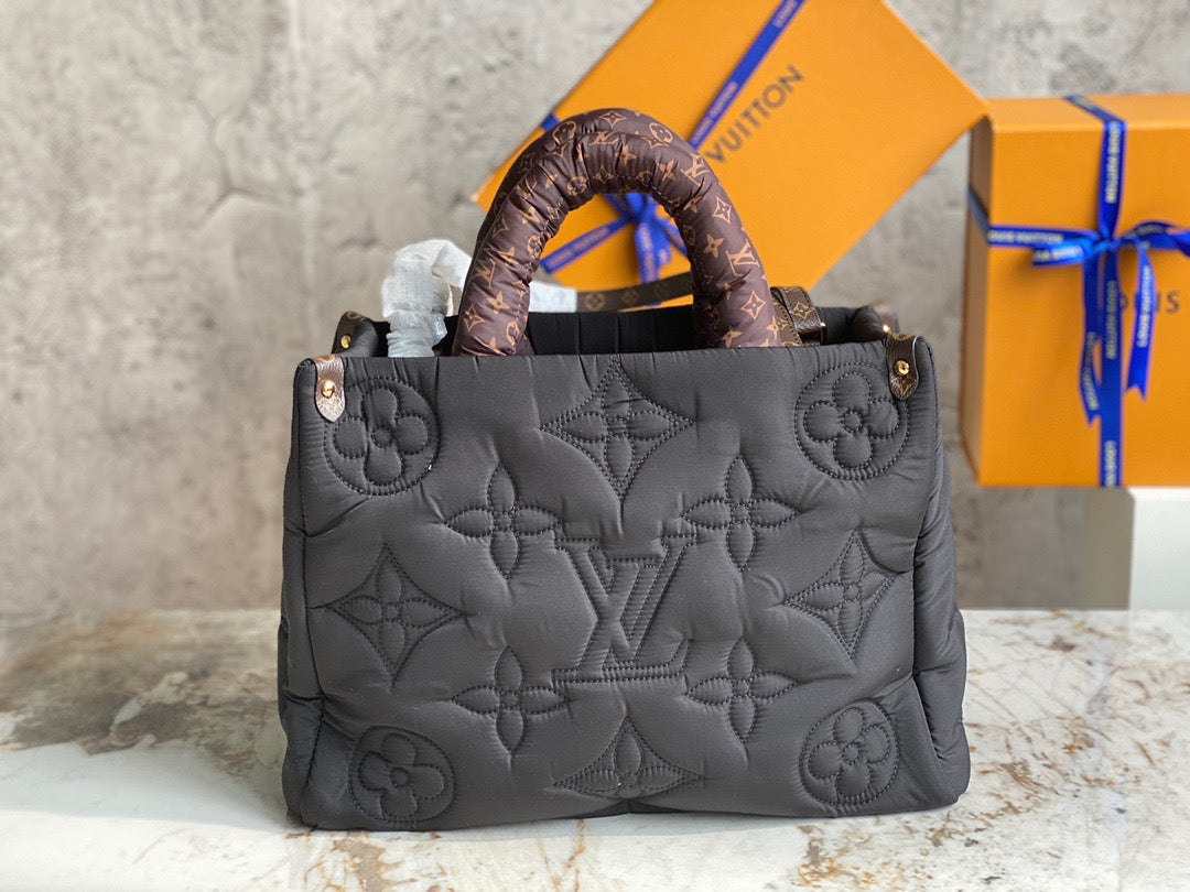 Louis Vuitton Onthego Tote Bag In Black Down Embossed