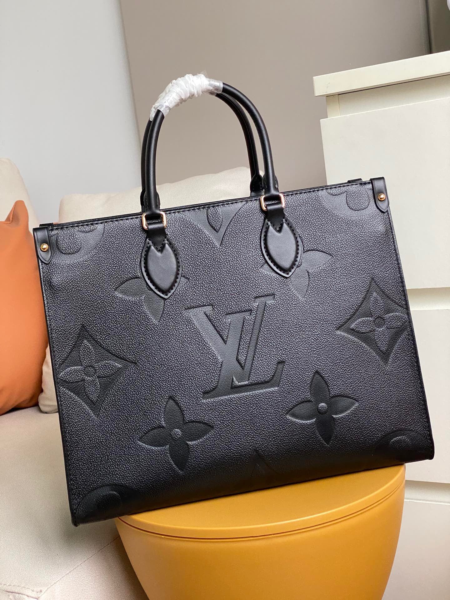 Louis Vuitton Onthego Handbags With Black Embossed