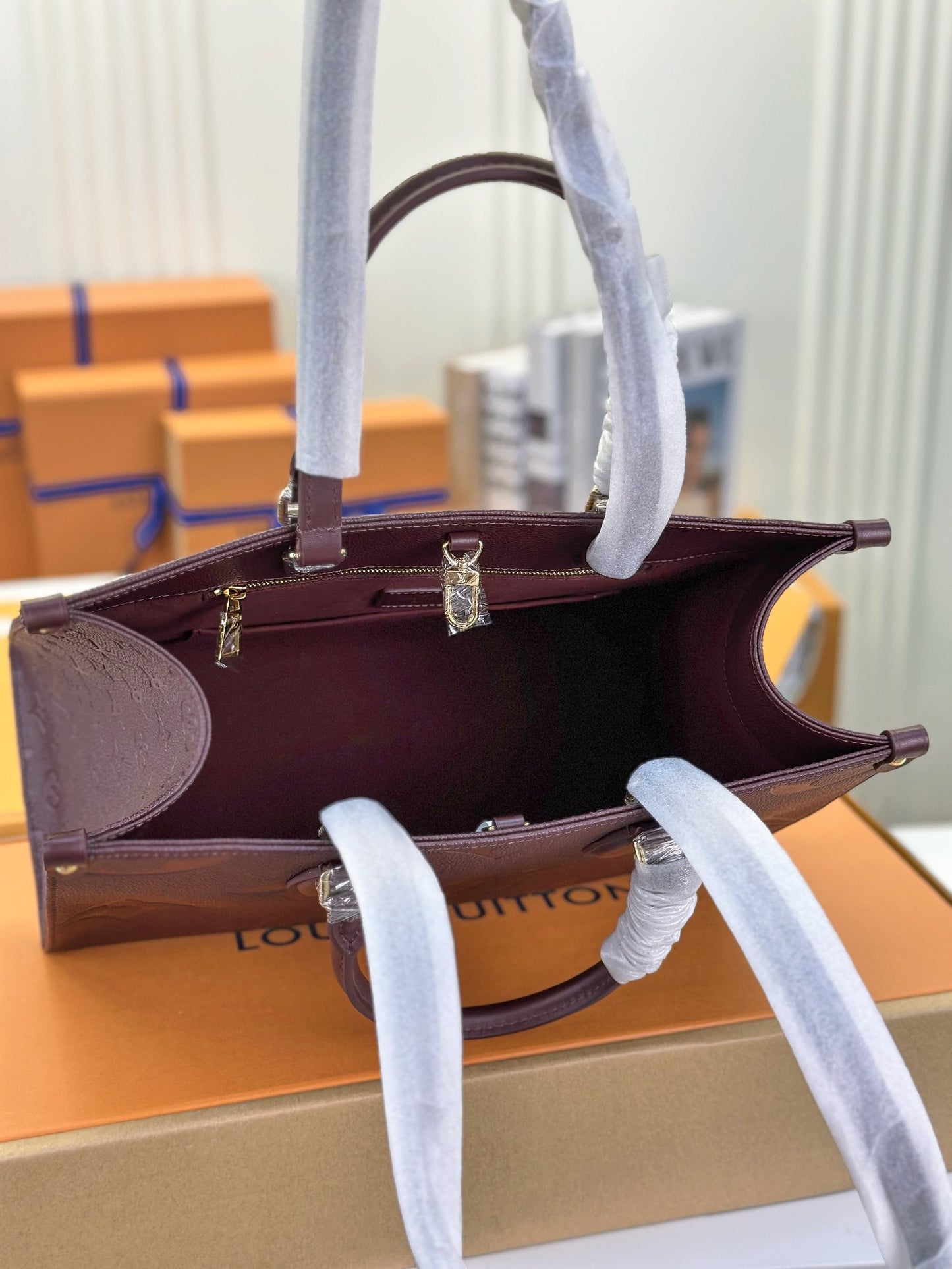 Louis Vuitton Onthego Handbags With Burgundy Embossed