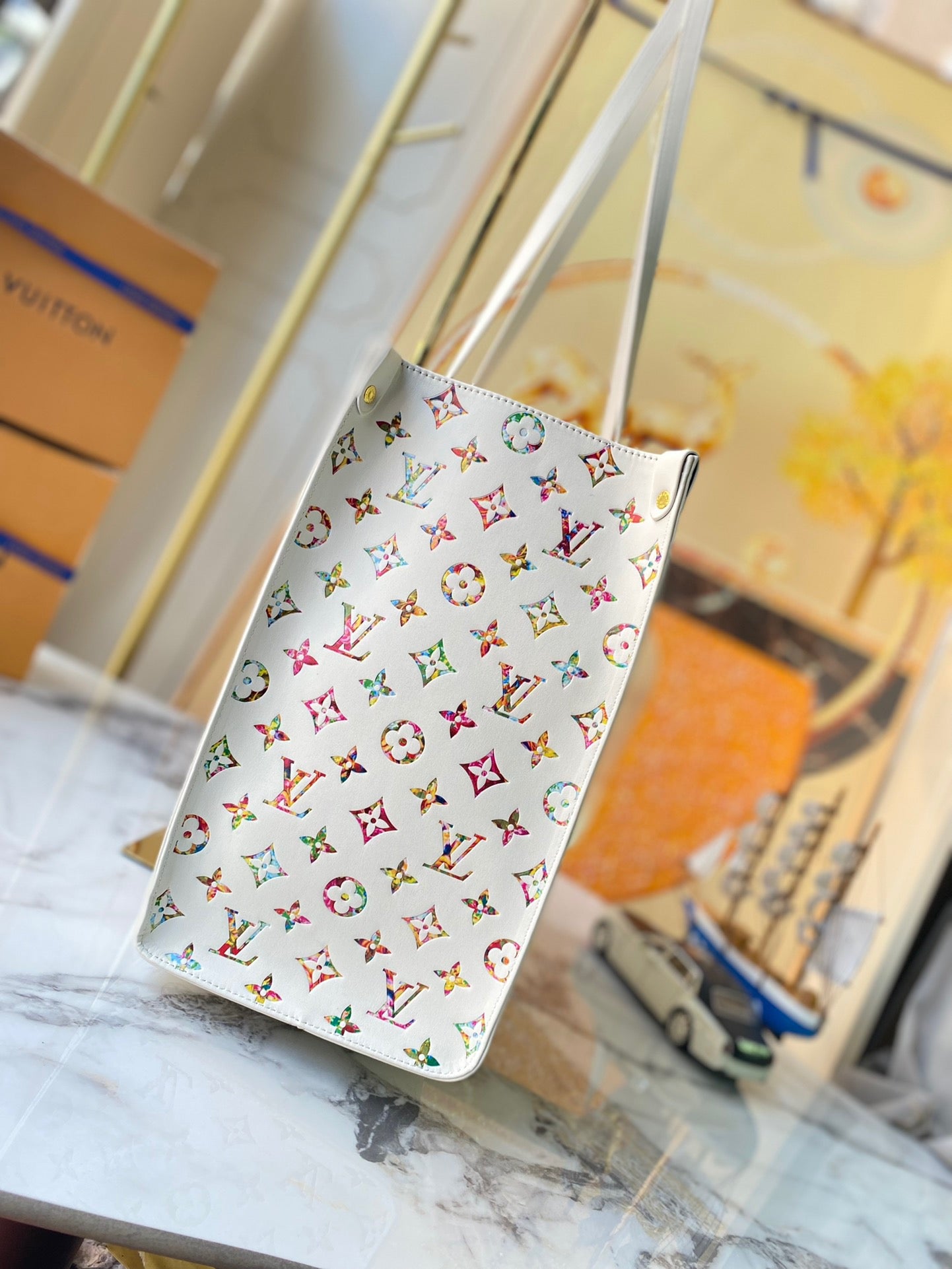 Louis Vuitton Onthego In White With Colorful Printed Tote Bag