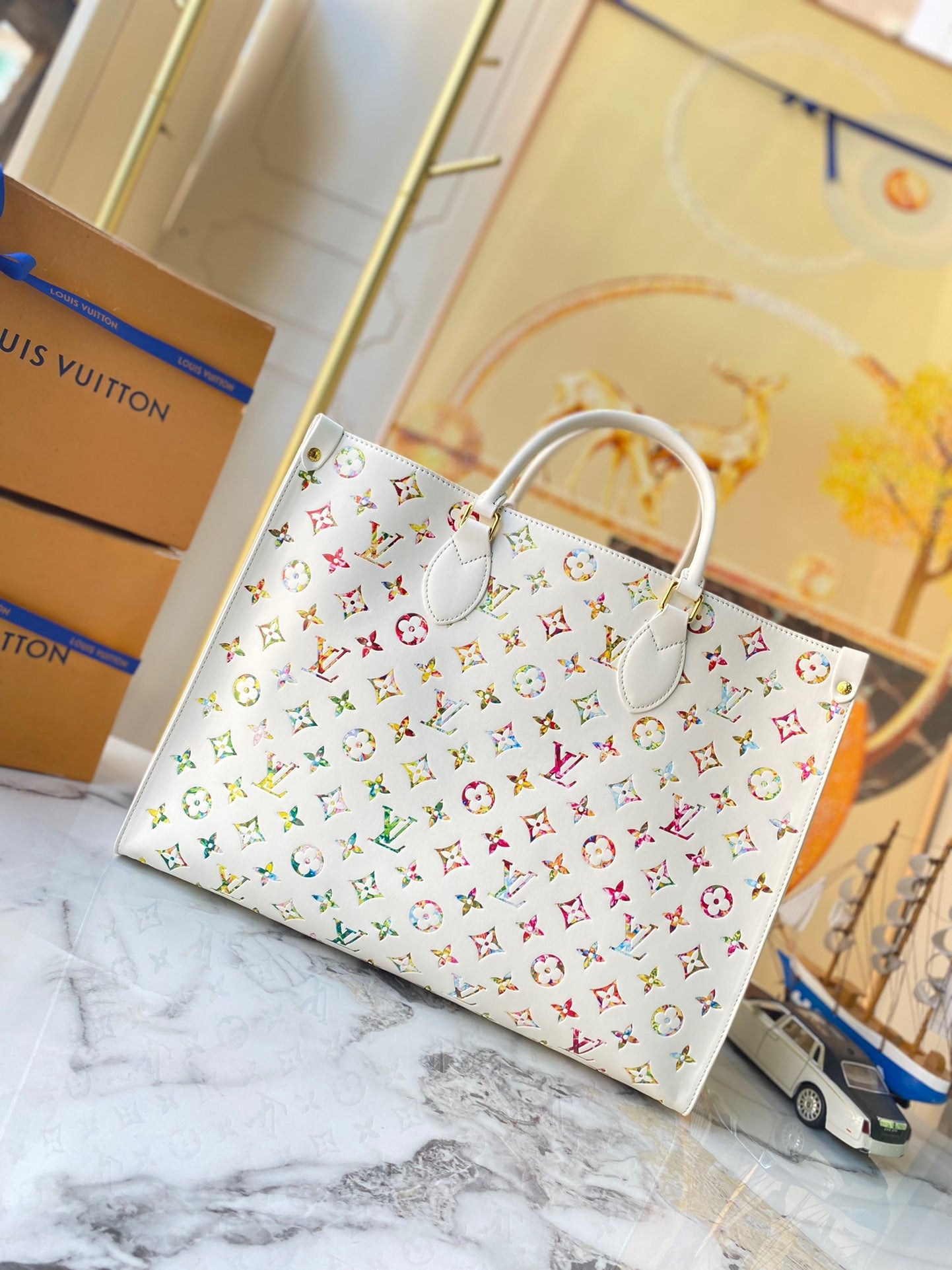 Louis Vuitton Onthego In White With Colorful Printed Tote Bag