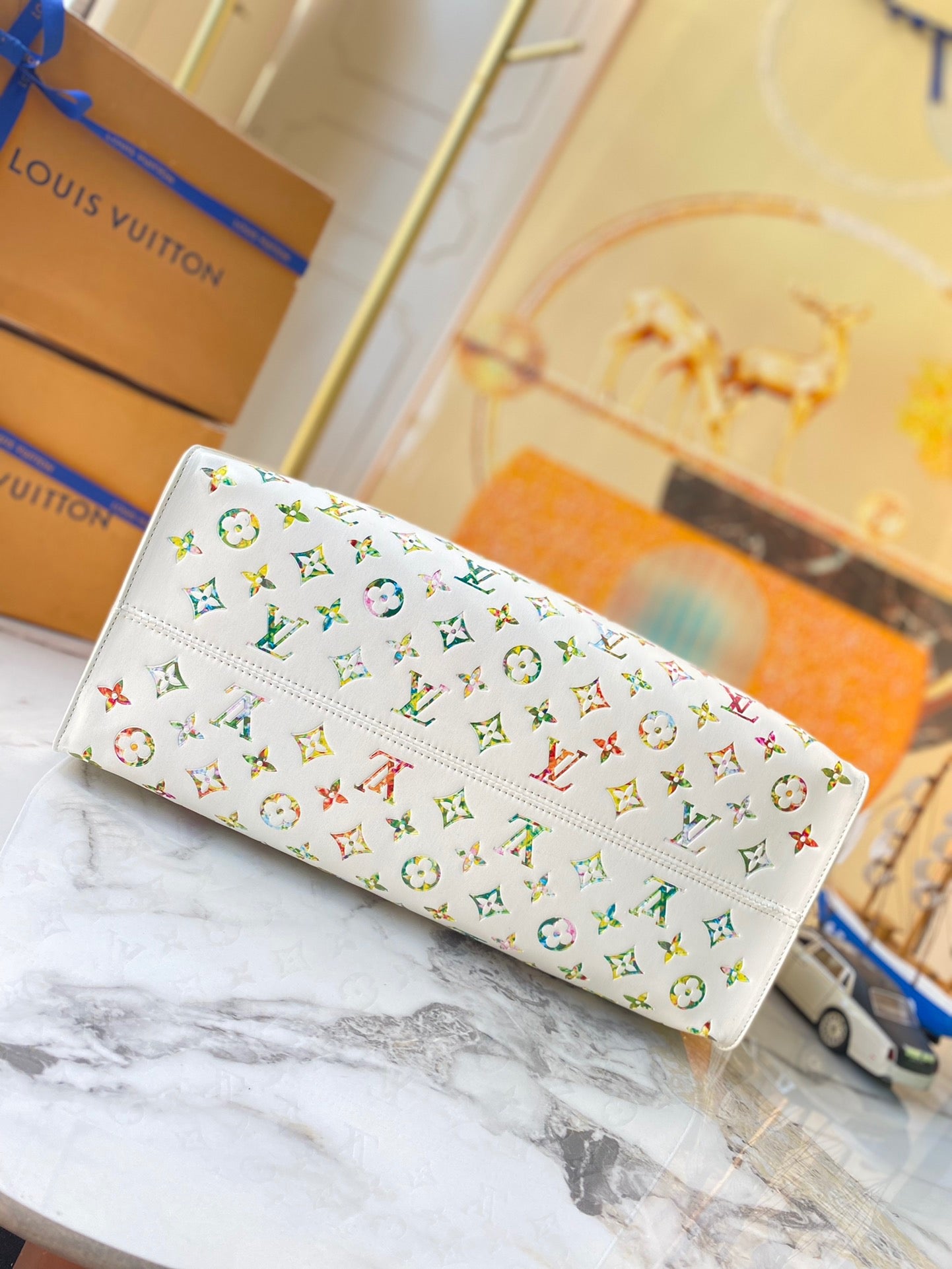 Louis Vuitton Onthego In White With Colorful Printed Tote Bag