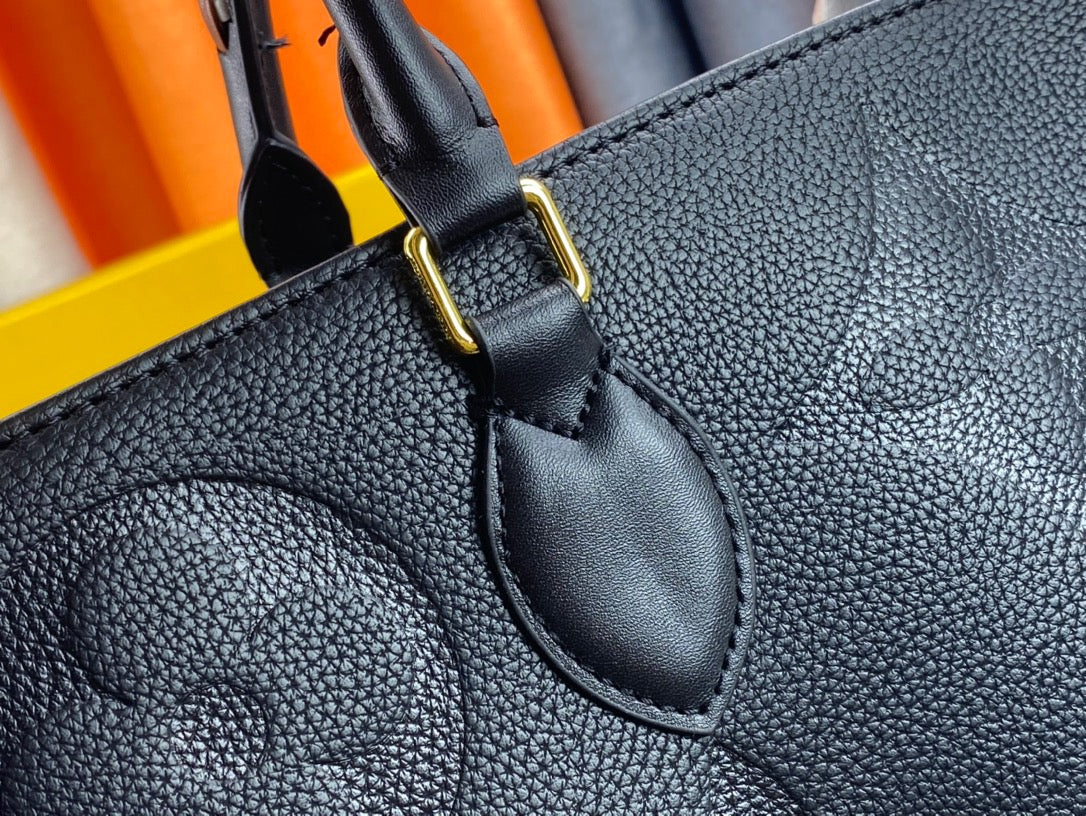 Louis Vuitton Onthego Handbags With Black Embossed