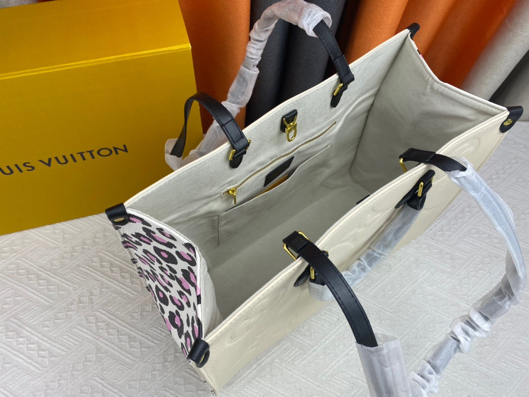 Louis Vuitton Onthego Handbags With Beige Embossed