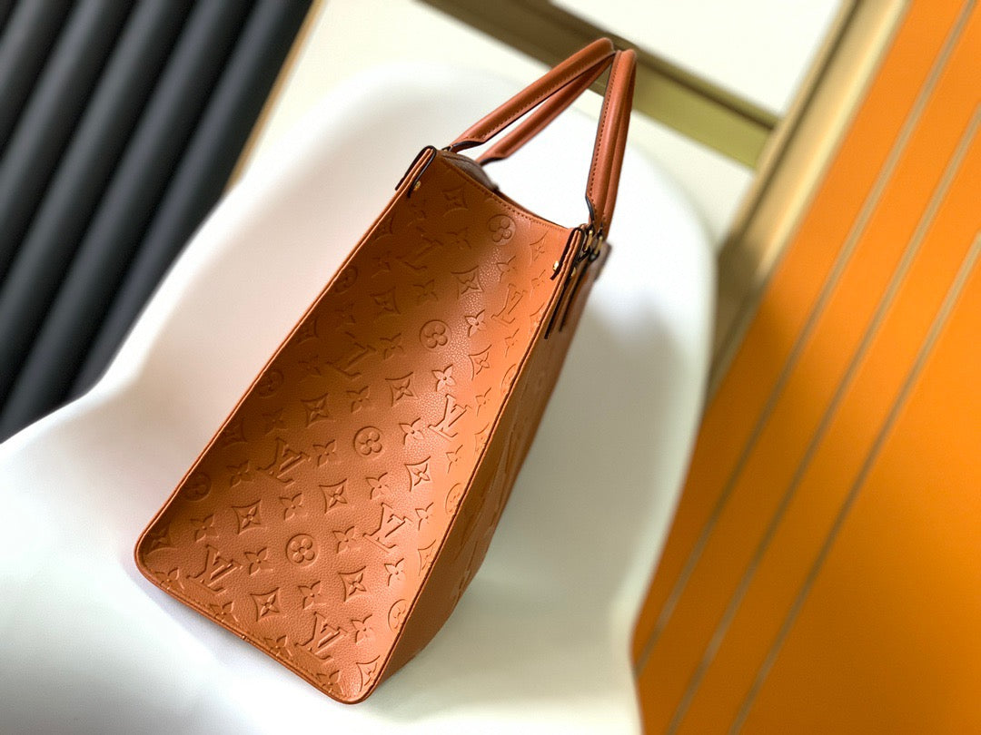 Louis Vuitton Onthego Handbags In Gold Brown With Embossed