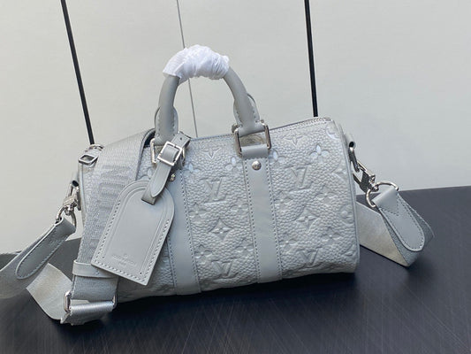 Louis Vuitton Keepall Bandouliere 25 Monogram Embossed White