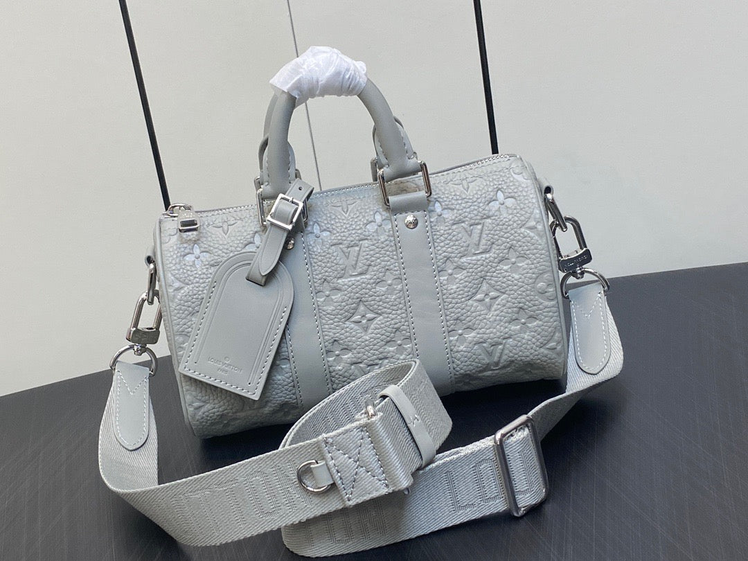 Louis Vuitton Keepall Bandouliere 25 Monogram Embossed White