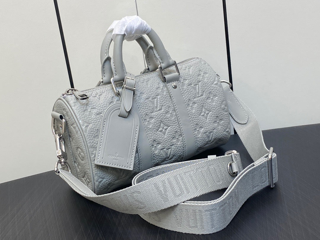 Louis Vuitton Keepall Bandouliere 25 Monogram Embossed White