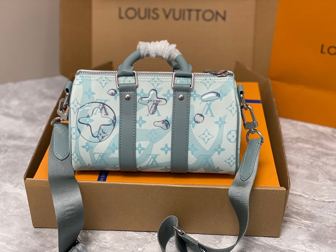 Louis Vuitton Keepall Bandouliere 25 Monogram Embossed Aqua Blue