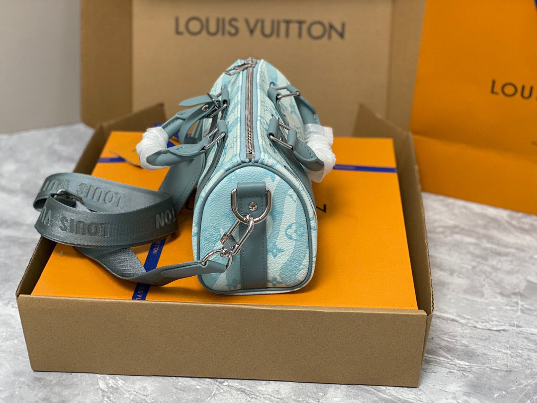 Louis Vuitton Keepall Bandouliere 25 Monogram Embossed Aqua Blue