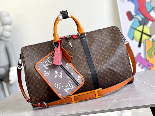 Louis Vuitton Keepall Bandouliere 50 Monogram Embossed Brown With Orange Strap