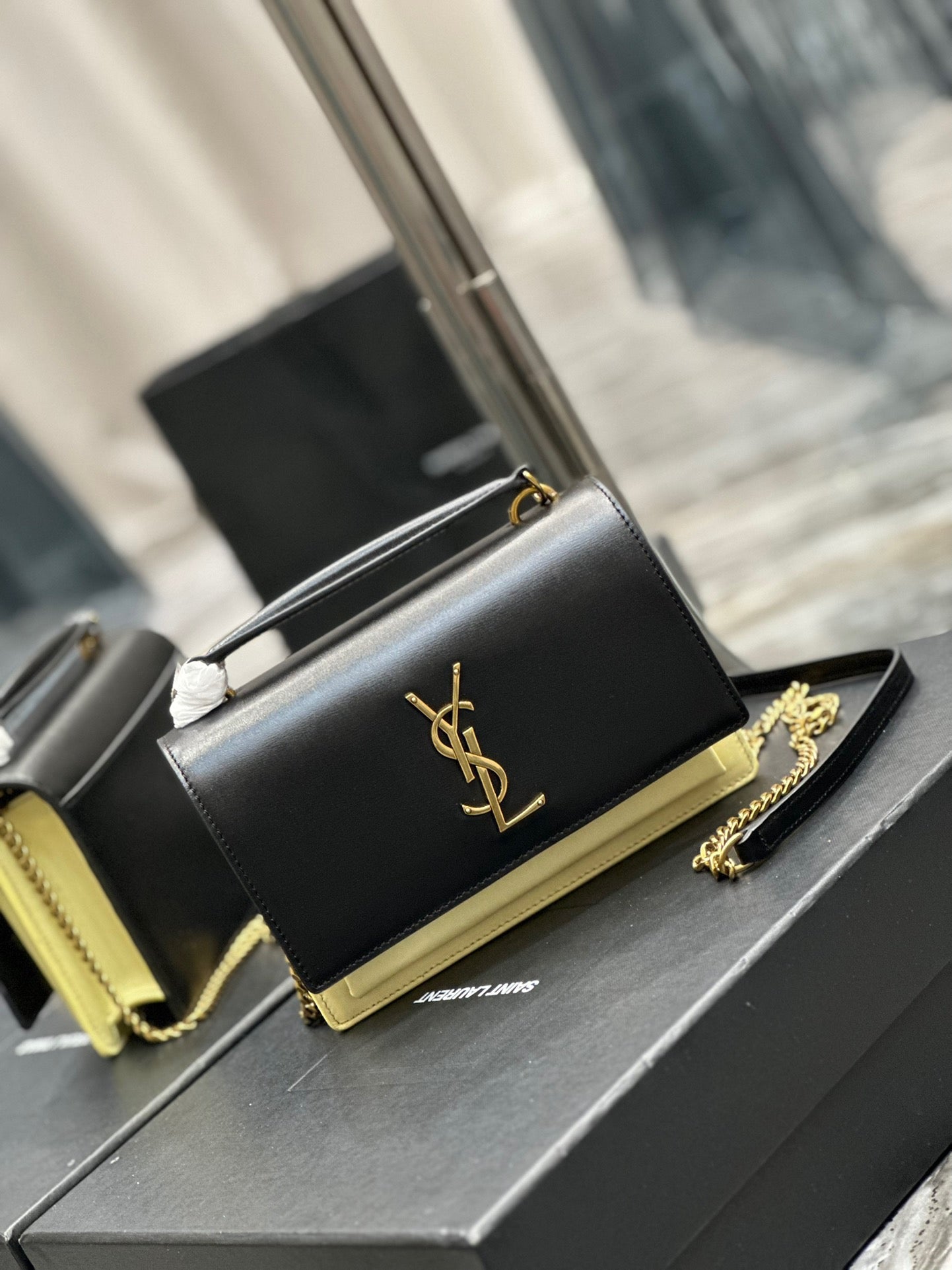 Saint Laurent Sunset Small Top Handle Bag In Black And Yellow Calfskin