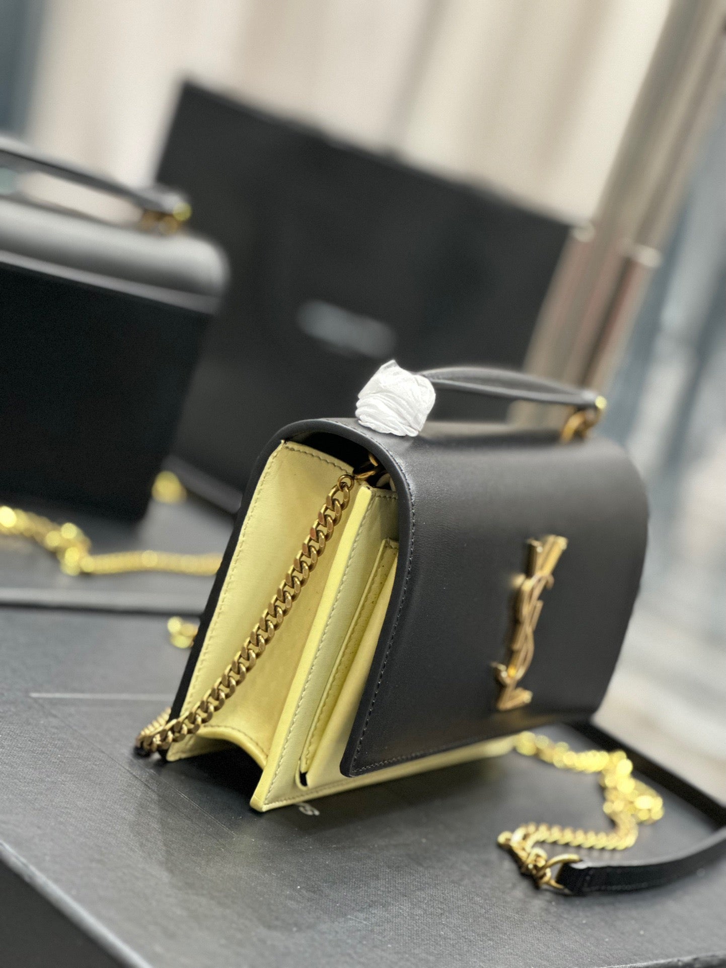 Saint Laurent Sunset Small Top Handle Bag In Black And Yellow Calfskin