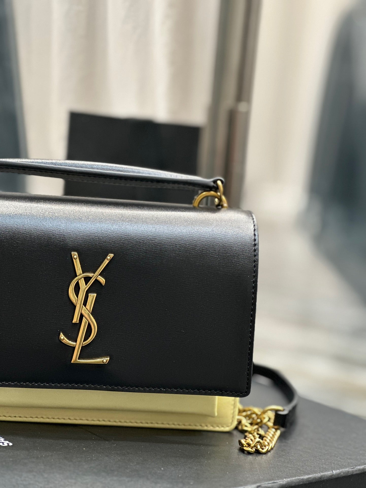 Saint Laurent Sunset Small Top Handle Bag In Black And Yellow Calfskin