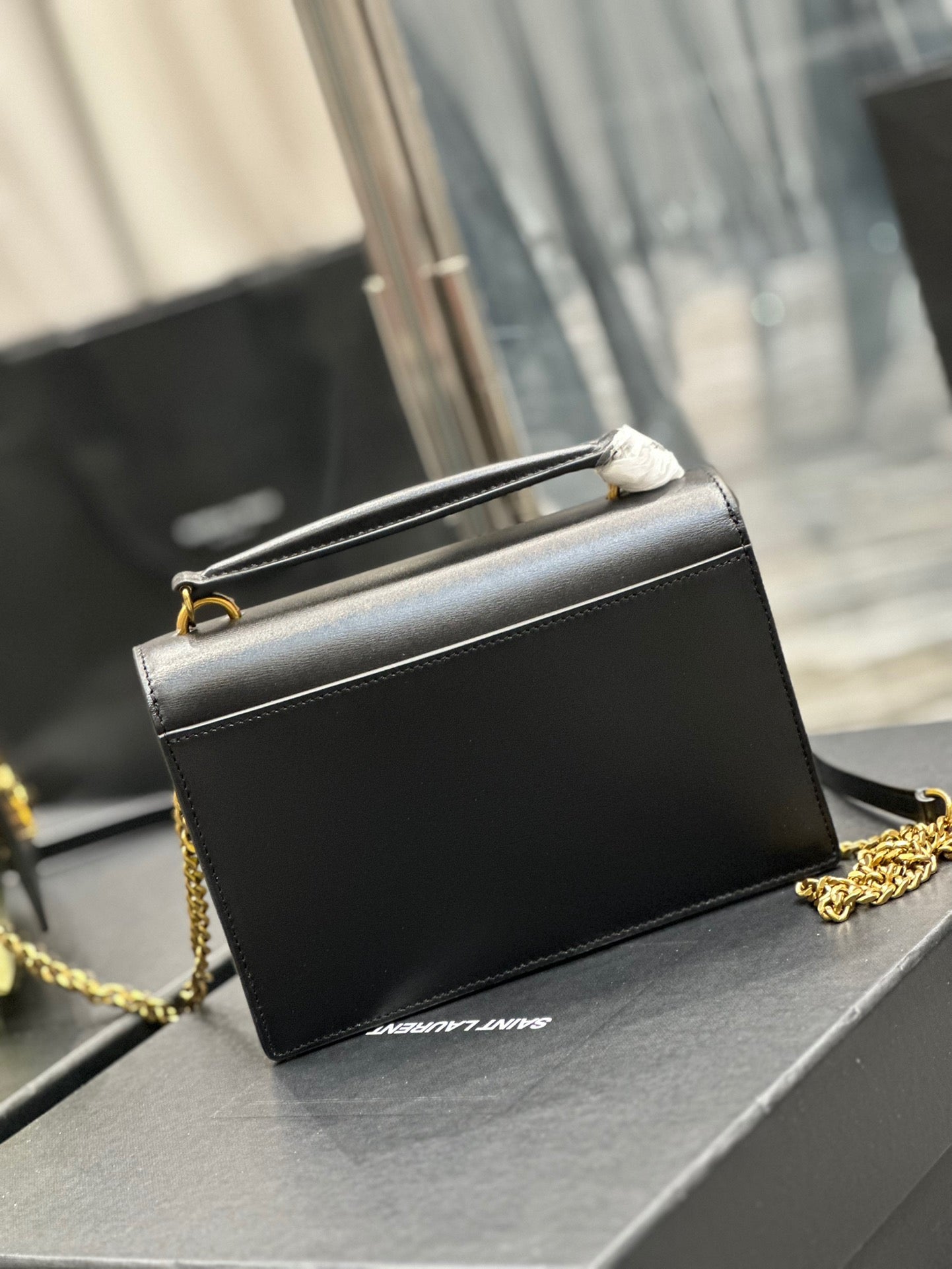 Saint Laurent Sunset Small Top Handle Bag In Black And Yellow Calfskin