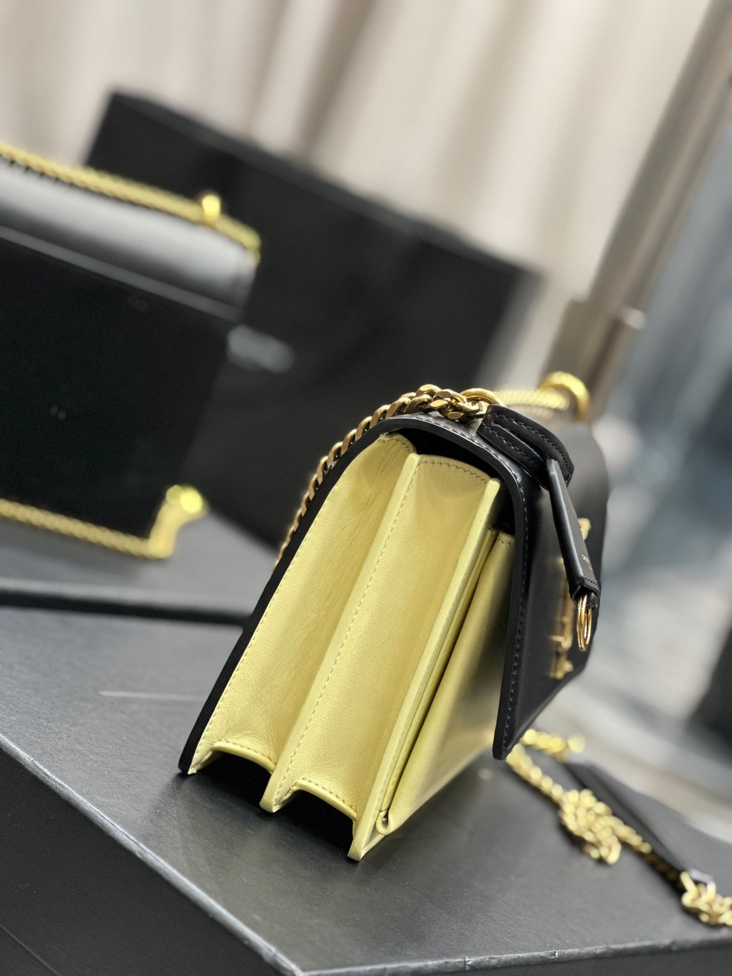 Saint Laurent Sunset Medium Chain Bag In Black And Yellow Calfskin