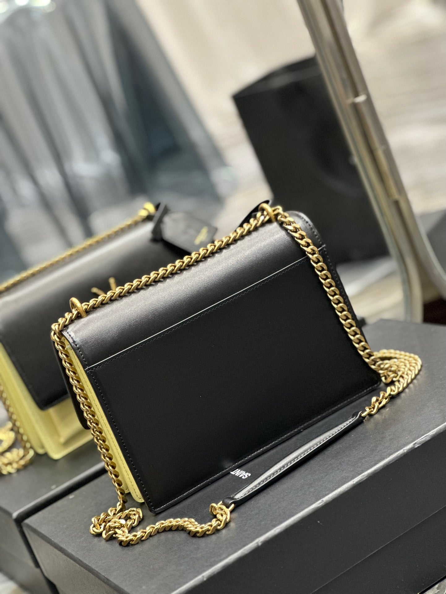 Saint Laurent Sunset Medium Chain Bag In Black And Yellow Calfskin