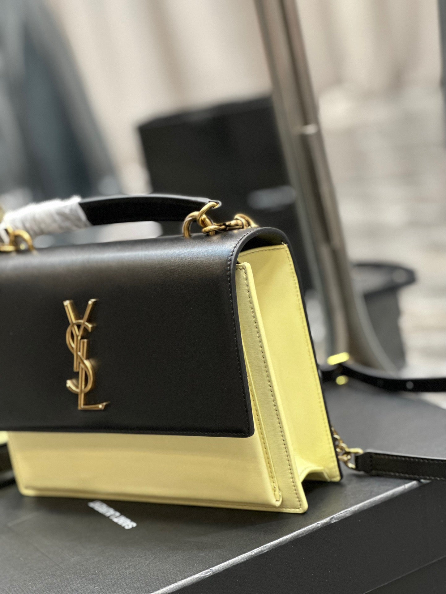 Saint Laurent Sunset Large Top Handle Bag In Black And Yellow Calfskin