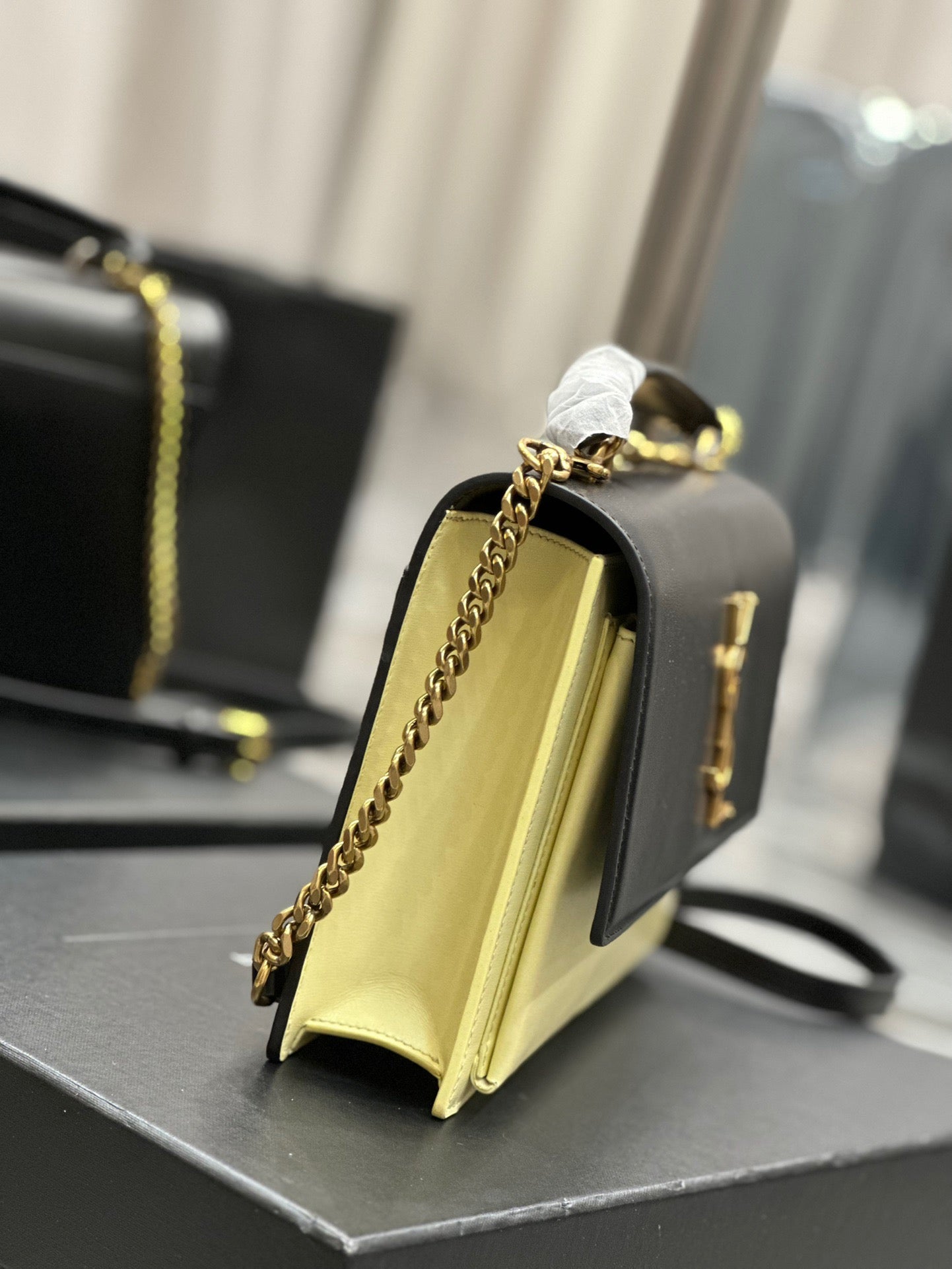 Saint Laurent Sunset Large Top Handle Bag In Black And Yellow Calfskin