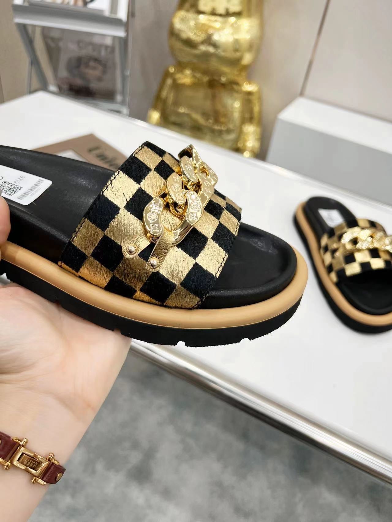 LV Slippers In Gold Checkerboard Pattern With Metal Decoration