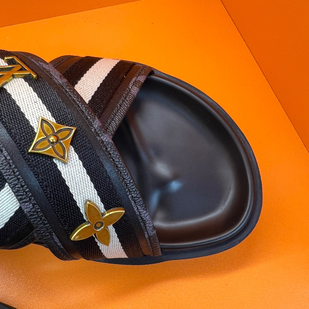 LV Monogram Embossed Black and White Slippers