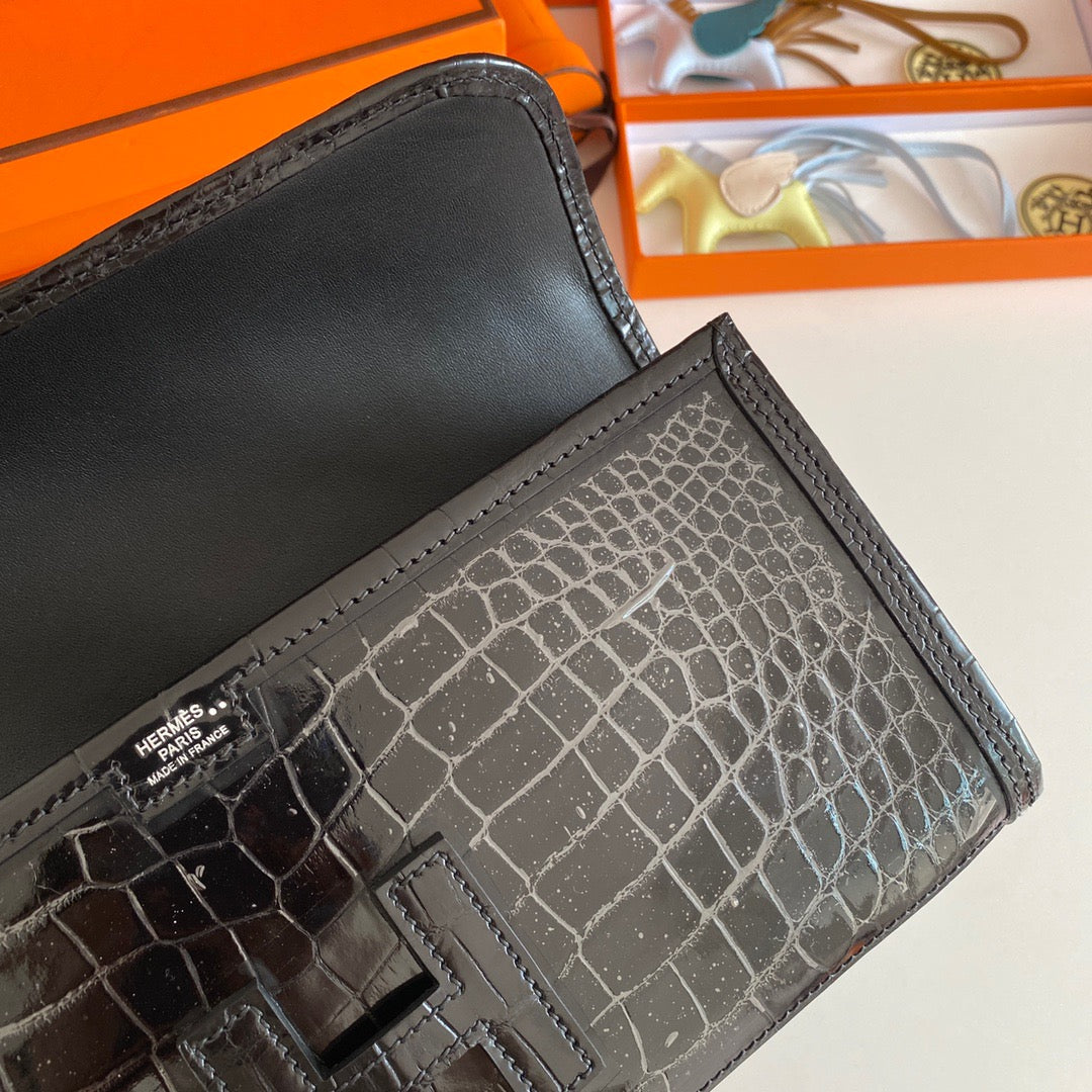 Hermes Jige Clutch In Black Crocodile Leather