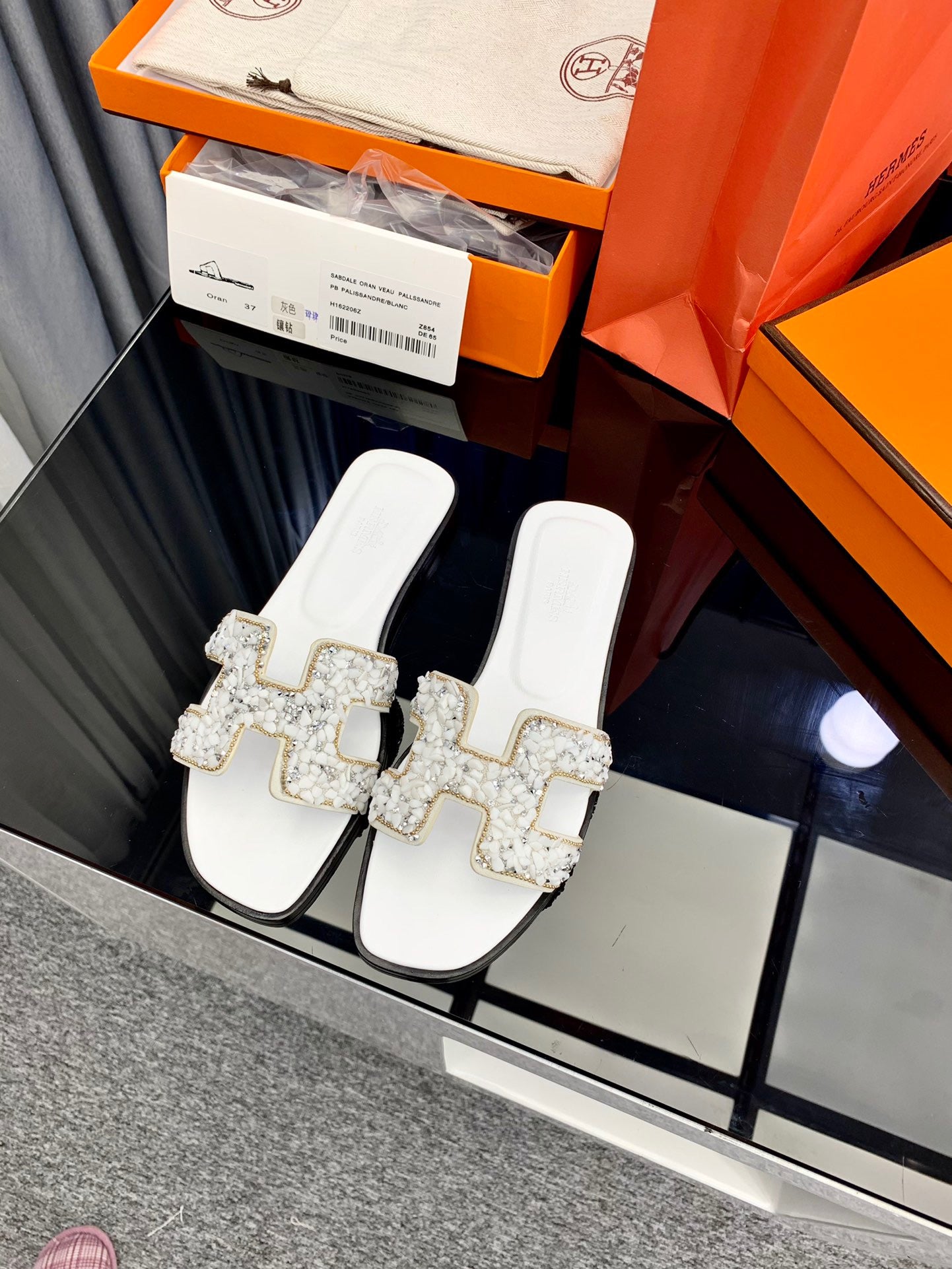 Hermes Oran Slides In White