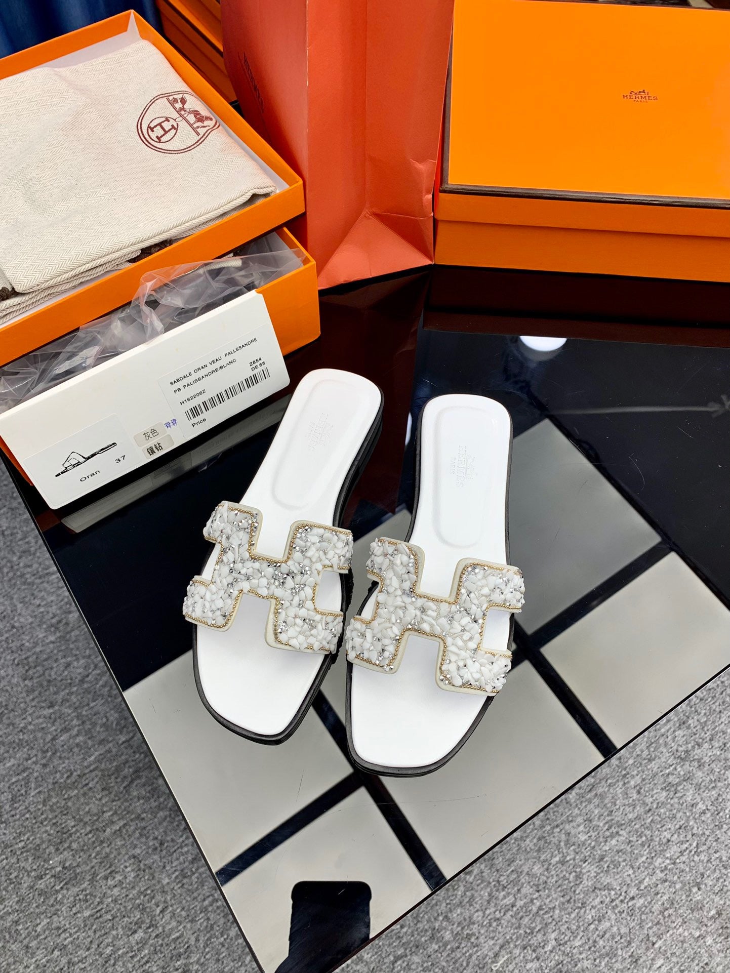 Hermes Oran Slides In White