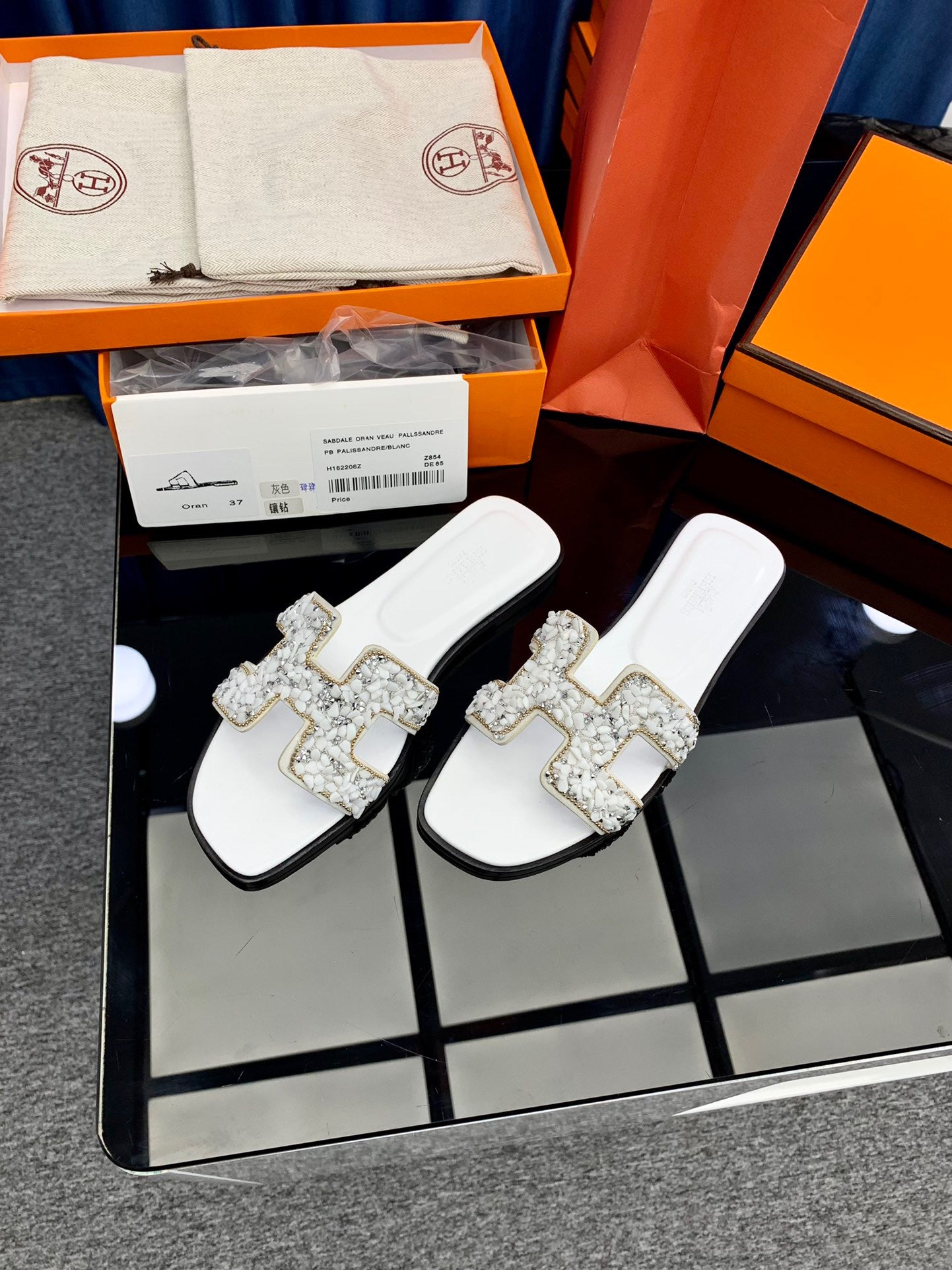 Hermes Oran Slides In White