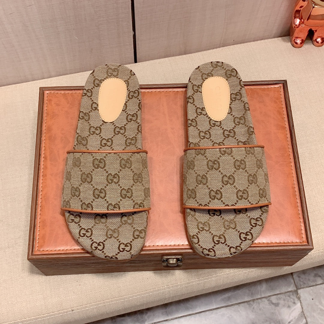 Gucci Men's GG Canvas Slides