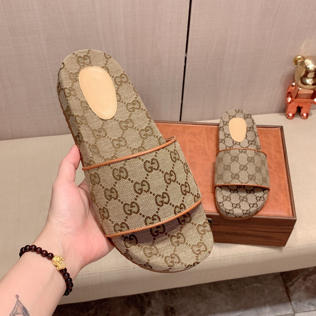 Gucci Men's GG Canvas Slides