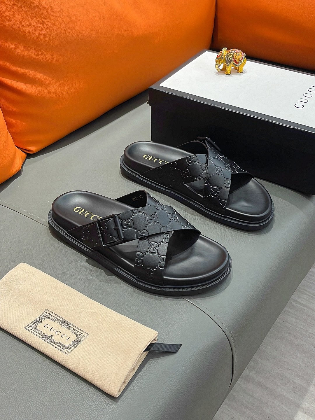 Gucci Black Embossed Slides