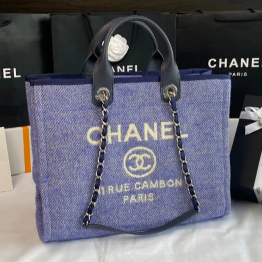 CHANEL Beach Canvas Tote Bag In Purple With Black Leather Strap